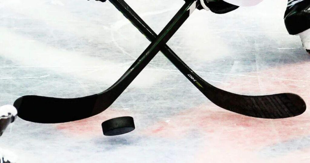 Eight hockey pucks